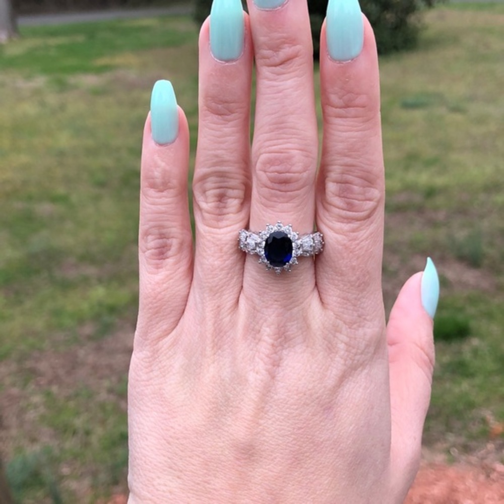 Navy blue and white around silver ring